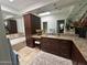 Spacious bathroom with granite counters, cabinetry, and a separate tub at 7272 E Gainey Ranch Rd # 121, Scottsdale, AZ 85258