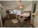 Comfortable main bedroom featuring a ceiling fan and charming decorative elements at 7272 E Gainey Ranch Rd # 121, Scottsdale, AZ 85258