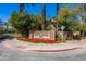 Entrance sign to The Pavilions community, showcasing beautiful landscaping and stone detail at 7272 E Gainey Ranch Rd # 121, Scottsdale, AZ 85258