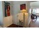 Entryway with art on the wall and an arched doorway leading to a living room at 7272 E Gainey Ranch Rd # 121, Scottsdale, AZ 85258
