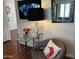 Cozy living area with unique decor, comfortable chair, and stylish lighting at 7272 E Gainey Ranch Rd # 121, Scottsdale, AZ 85258