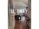 Stylish living room features high ceilings, hardwood floors, and an abundance of natural light at 7272 E Gainey Ranch Rd # 121, Scottsdale, AZ 85258