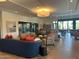 Inviting lounge area with comfortable seating, stylish decor, and a bright, open atmosphere at 7272 E Gainey Ranch Rd # 121, Scottsdale, AZ 85258