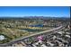 Aerial view of the community, highlighting its location near golf courses and mountain views at 7575 E Indian Bend Rd # 2002, Scottsdale, AZ 85250
