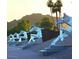 Artistic sculpture of horses with mountains in the background at 7575 E Indian Bend Rd # 2002, Scottsdale, AZ 85250