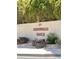 Attractive entrance to Arrowhead Ranch community featuring flowering plants adding charm at 7633 W Kristal Way, Glendale, AZ 85308