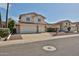 Two-story home featuring a terracotta roof, attached three-car garage, and manicured landscaping at 7633 W Kristal Way, Glendale, AZ 85308