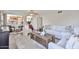 Open living area with hardwood floors, a staircase, and views into the kitchen, creating an airy feel at 7633 W Kristal Way, Glendale, AZ 85308