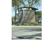 View of The Village at Arrowhead sign with list of stores and address range at 7633 W Kristal Way, Glendale, AZ 85308