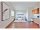 Cozy sitting room features modern decor, built-in cabinets, and natural light at 7633 W Kristal Way, Glendale, AZ 85308