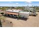 Expansive aerial view of property showing a unique roof and landscaping at 9224 N 126Th St, Scottsdale, AZ 85259