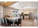 Modern kitchen boasts stainless appliances, breakfast bar, and backsplash at 9224 N 126Th St, Scottsdale, AZ 85259