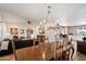 Open-concept living space featuring a dining area, living room, and modern kitchen at 9224 N 126Th St, Scottsdale, AZ 85259