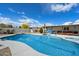 Large outdoor pool surrounded by lush landscaping, perfect for relaxation and entertainment at 9224 N 126Th St, Scottsdale, AZ 85259