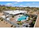 Beautiful pool area in a desert landscape, featuring lounge chairs, desert landscaping, and mountain views at 9224 N 126Th St, Scottsdale, AZ 85259