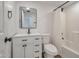 Bright bathroom features a white vanity, a shower with tub, and updated fixtures at 948 S Alma School Rd # 13, Mesa, AZ 85210