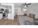 Open floor plan combining a kitchen with a living area, perfect for entertaining at 948 S Alma School Rd # 13, Mesa, AZ 85210