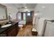 Bathroom featuring a soaking tub, walk-in shower, dark vanity and tile flooring at 9629 N 83Rd Way, Scottsdale, AZ 85258
