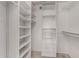 Walk-in closet with custom shelving at 9629 N 83Rd Way, Scottsdale, AZ 85258
