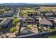 Lovely home features an expansive backyard with a trampoline, grassy area, detached structure and lush desert landscaping at 17451 W Hadley St, Goodyear, AZ 85338