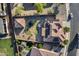 Aerial view of a backyard, with a detached structure, outdoor seating and a small grass area with a trampoline at 17451 W Hadley St, Goodyear, AZ 85338