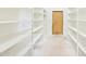 Spacious pantry with lots of shelving space providing ample storage for all your groceries and essentials at 3215 N 83Rd St, Mesa, AZ 85207