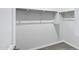 Walk-in closet with white walls and shelving at 35733 W Santa Monica Ave, Maricopa, AZ 85138