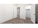 Bedroom featuring an open closet and access to an adjoining room at 4992 E Rhodium Dr, San Tan Valley, AZ 85143