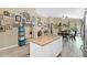 Open-concept dining area seamlessly connects to the modern kitchen and adjacent living spaces at 15391 W Yucatan Dr, Surprise, AZ 85379