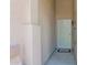 Inviting entryway featuring a secure screen door and neutral color scheme at 15391 W Yucatan Dr, Surprise, AZ 85379