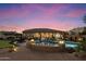 Expansive backyard with a pool, putting green, and multiple seating areas for ultimate relaxation and entertainment at 22635 N 54Th Pl, Phoenix, AZ 85054