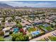 Residential neighborhood with mature landscaping, tennis courts, swimming pools, sport courts, circular driveways, and more at 3356 E Vallejo Ct, Gilbert, AZ 85298