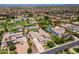 Beautiful single Gathering home with tennis court, mature landscaping, pool, sport court and three car garage at 3356 E Vallejo Ct, Gilbert, AZ 85298