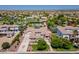 Expansive estate featuring a private pool, lush landscaping, a circular driveway, and a three-car garage at 3356 E Vallejo Ct, Gilbert, AZ 85298