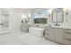 Spa-like bathroom with double vanities, freestanding tub, and stylish accents at 3356 E Vallejo Ct, Gilbert, AZ 85298