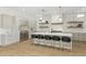 Modern kitchen features a large island with seating and stainless steel appliances at 3356 E Vallejo Ct, Gilbert, AZ 85298