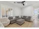 Cozy living room with a comfortable sectional sofa, ample seating, and natural light at 3356 E Vallejo Ct, Gilbert, AZ 85298