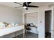 Simple bedroom with a lofted bed, a desk, and closet space, creating a functional and tidy area at 3722 E Glade Ave, Mesa, AZ 85206