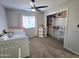 A cheerful bedroom featuring a toddler's bed and a well-organized closet at 3722 E Glade Ave, Mesa, AZ 85206