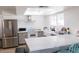 Bright kitchen featuring stainless steel appliances, white countertops, and a large undermount sink at 3722 E Glade Ave, Mesa, AZ 85206