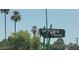Sign for Uptown Plaza surrounded by lush trees on a sunny day, showcasing the neighborhood's local businesses at 540 W Mariposa St # 9, Phoenix, AZ 85013