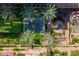 Aerial view of a community with pools and greenery; great spot for recreation and relaxation at 7131 E Rancho Vista Dr # 1008, Scottsdale, AZ 85251