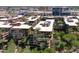 Aerial shot featuring a condo complex with beautifully landscaped terraces and city views at 7131 E Rancho Vista Dr # 1008, Scottsdale, AZ 85251