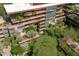 Aerial view showcasing modern condo complex, highlighting the unique architecture and lush rooftop gardens at 7131 E Rancho Vista Dr # 1008, Scottsdale, AZ 85251