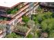 Close-up aerial view of private condo balconies with lush landscaping and garden views at 7131 E Rancho Vista Dr # 1008, Scottsdale, AZ 85251