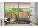 View of the balcony surrounded by lush greenery provides a private outdoor space at 7131 E Rancho Vista Dr # 1008, Scottsdale, AZ 85251