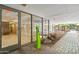 Bright entrance with glass doors, well-maintained pavers, and accessible parking creates a welcoming and convenient arrival at 7131 E Rancho Vista Dr # 1008, Scottsdale, AZ 85251