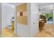 Hallway view of the kitchen, living area, and half bathroom at 7131 E Rancho Vista Dr # 1008, Scottsdale, AZ 85251