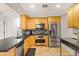 Well-lit kitchen with stainless steel appliances and a decorative backsplash at 7131 E Rancho Vista Dr # 1008, Scottsdale, AZ 85251