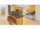Modern kitchen with stainless steel appliances and eat-in breakfast bar at 7131 E Rancho Vista Dr # 1008, Scottsdale, AZ 85251